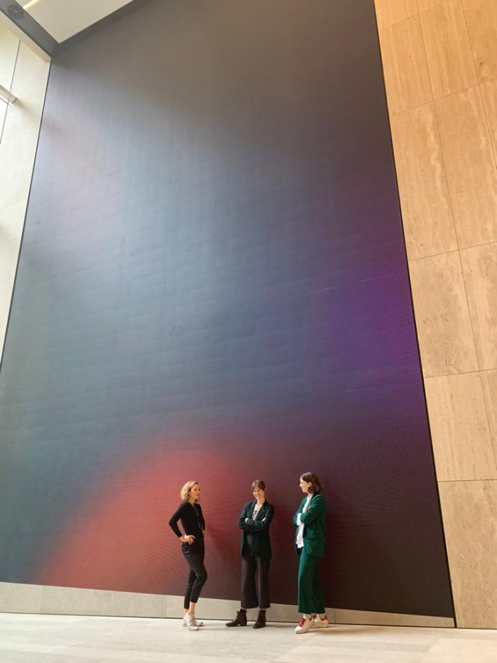 The Art Pharmacy team outside of the 12 meter digital art wall at 80 Collins Street, Melbourne