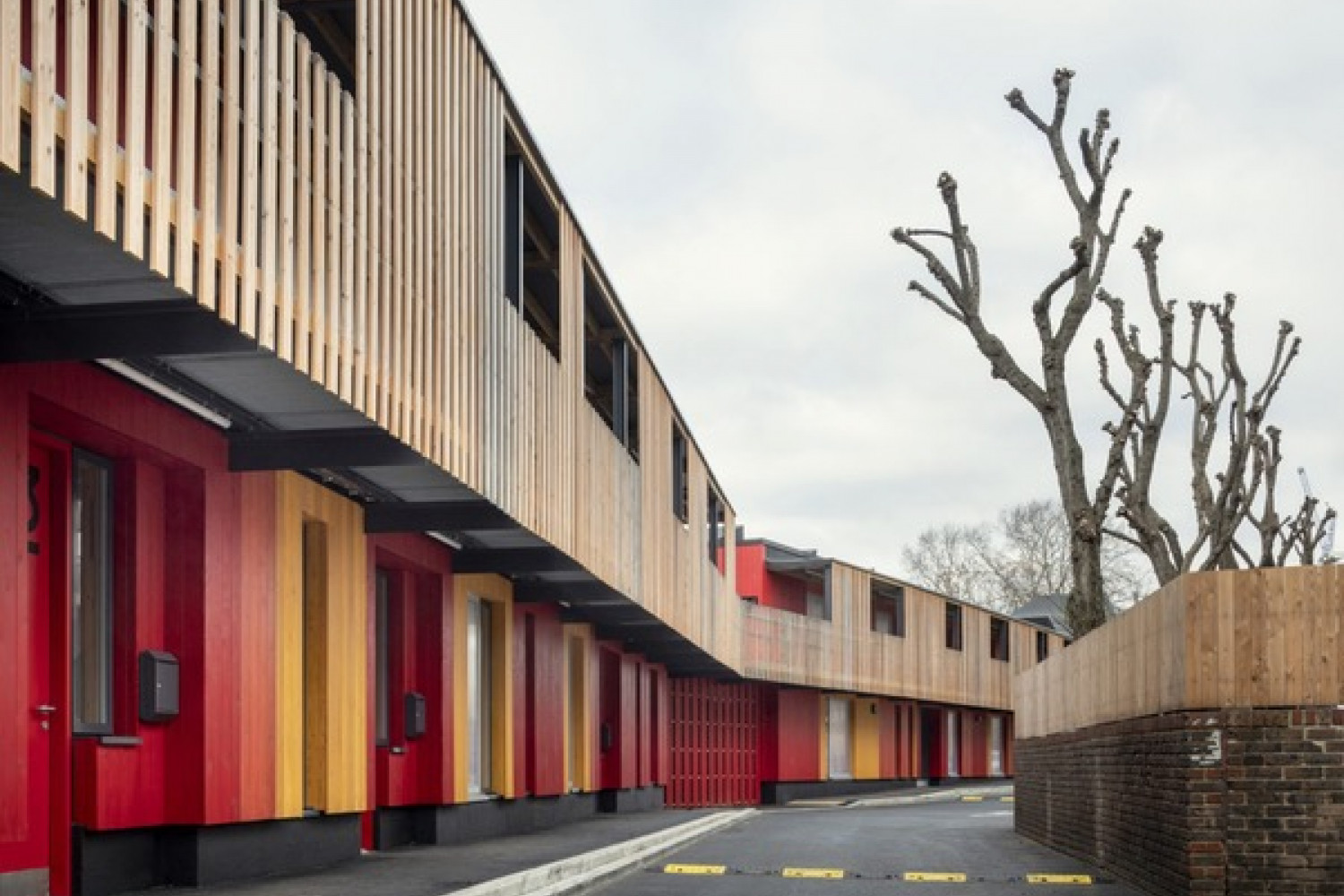 Colourful street frontage, Poplar project. Photo: Anthony Coleman